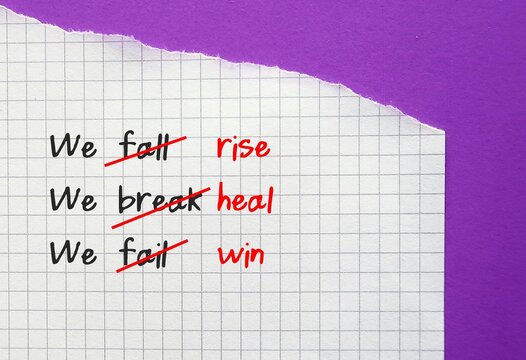 Note with text written WE FALL WE BREAK WE FAIL replaced with WE RISE WE HEAL WE WIN - lesson learned from mistakes leads to self improvement - negative thoughts with positive ones with growth mindset
