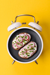 Breakfast sandwich with toast, tuna and avocado