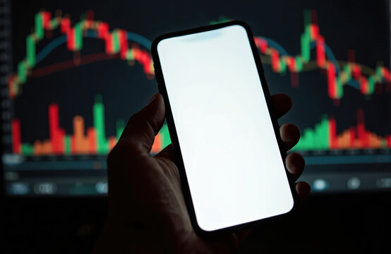 Smartphone blank screen. Stock market graph background. Person holds phone, trading online, checking stock prices, financial news, market analysis. Modern tech. Business investment at night.