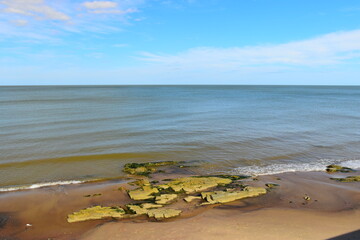 Montevideo, Uruguay, South America. May, 15, 2025. Amazing urban coastal scene on the coast of the Rio de la Plata near Playa Ramirez beach ant the famous Rambla boulevard in the capital.