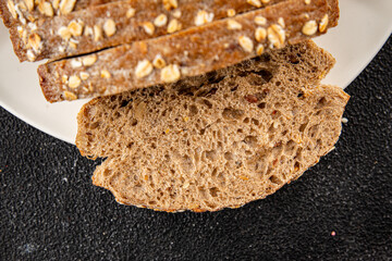 Oat bread wholegrain bun oatmeal pastry natural food fresh gourmet food background on the table rustic food top view copy space
