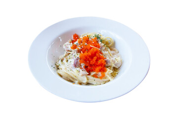 Spaghetti with shrimp with seafood salad flavor with Crab eggs and cheese on top on white plate. Noodles beautiful and delicious Italian food. Isolated on cutout PNG or transparent background.