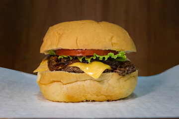 classic burger with cheese and vegetables