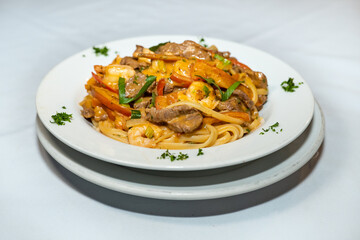 spaghetti with surf and turf sauce