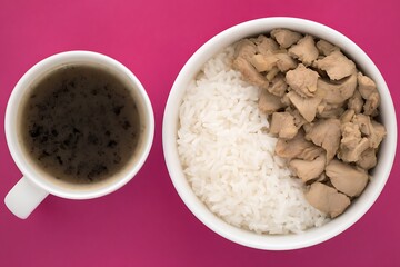 Rice chicken and coffee on pink