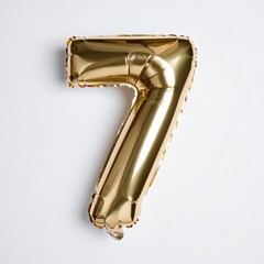 Gold balloon number 7 with solid white background for birthday or anniversary party