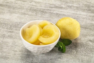 Canned yellow pear with syrup