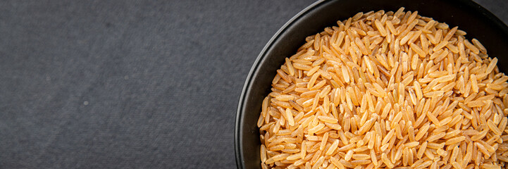 Brown rice cereal whole grain healthy product superfood fresh tasty food background on the table rustic food top view copy space