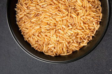 Brown rice cereal whole grain healthy product superfood fresh tasty food background on the table rustic food top view copy space