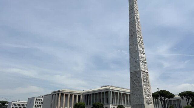 Footage of the Obelisk of Marconi, a monument in Rome dedicated to the famous inventor Guglielmo Marconi. This striking obelisk stands as a tribute to scientific innovation and Italian history. Ideal 