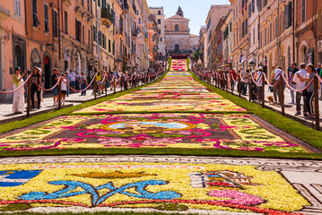Infiorata - flower petals carpet, images made with flowers