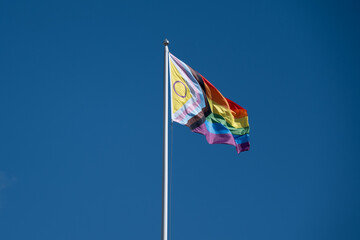 A Pride Flag against Clear Blue Sky