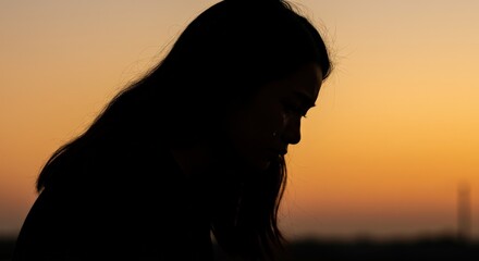 Silhouette person sunset profile