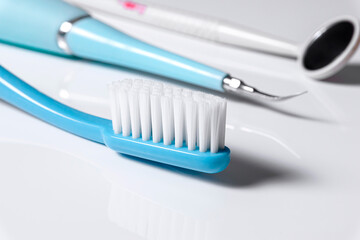 Tootbrush and tools for dental cleaning at home.