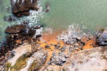 Beautiful ocean landscape from a drone. View of the ocean, rocks and sand.