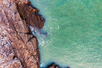 Beautiful ocean landscape from a drone. View of the ocean, rocks and sand.
