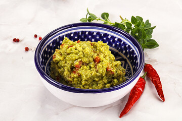 Guacamole with avocado, tomato and chili