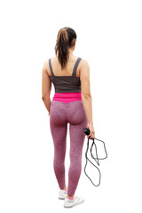 Young sporty woman with skipping rope, back view. isolated on a transparent background