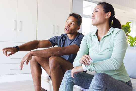 Couple relaxing at home, enjoying conversation and quality time together