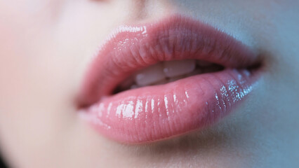 Fototapeta premium Close-up of Sensual Lips with Glossy Lipstick