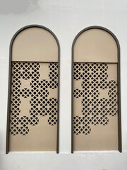 Arched building window with pattern inside