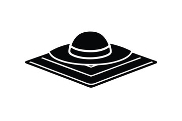 Sun hat on beach towel summer vacation silhouette
