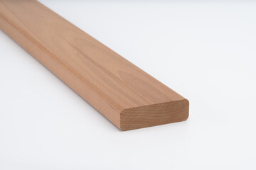 Brown hardwood board with straight edges and smooth finish, placed on white background. Suitable for carpentry, interior work, or furniture crafting..