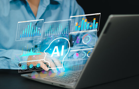 Businessperson. AI Analyze and marketing prediction analysis. Artificial intelligence analyzing customer behavior data. Data scientist using laptop computer to give instructions to AI.