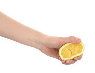 Woman squeezing lemon on white background, closeup