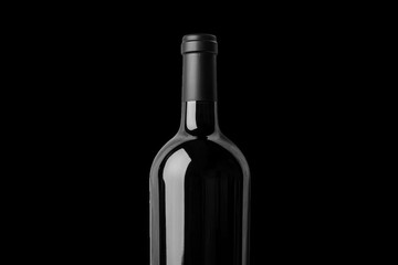 Dark glass wine bottle against black background