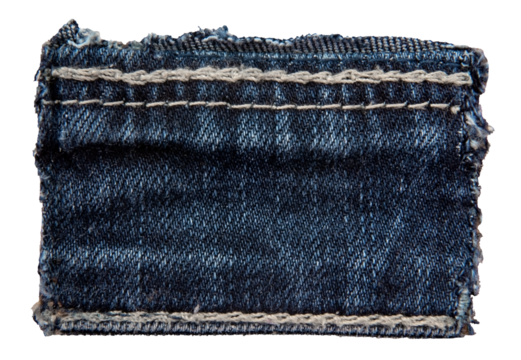 Piece of torn denim on a white background. Denim texture