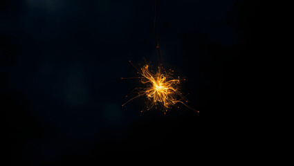 Abstract photo of glowing light swirls on dark backgroun