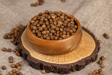 fried chickpeas are on the table with a tablecloth, porridge in a bowl, side view