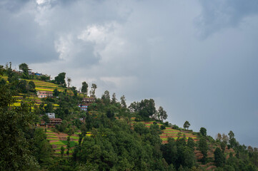 Terraced farming in Nepal. Village on a terraced hill in Himalayas, Nepal. Rise fields. Agricultural concept