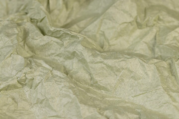 part of a sheet of paper crumpled after use
