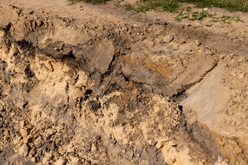 pit before asphalting a road, a hole in the ground on the site of which a highway was started