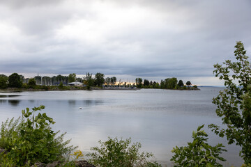 Ottawa river during sunset. Waterfront landscape and skyline in summer. Andrew Haydon Park in Canada