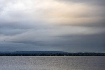 Skyline and river during sunset. Ottawa river in Canada