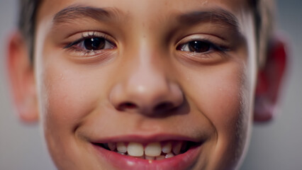 Close-up Portrait of a Smiling Young Boy