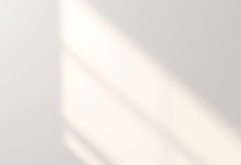 Soft light illuminates a pale gold, subtly grey textured surface , illumination, texture