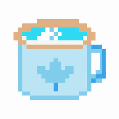 Obraz premium Pixel art blue mug with steaming hot drink, maple leaf design
