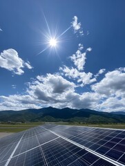 Solar Panels Under Bright Sun and Mountains - Clean energy solar panels generating power under a bright sunny sky with mountains in the background