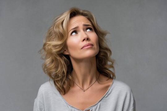 blond mid age woman looking for solution