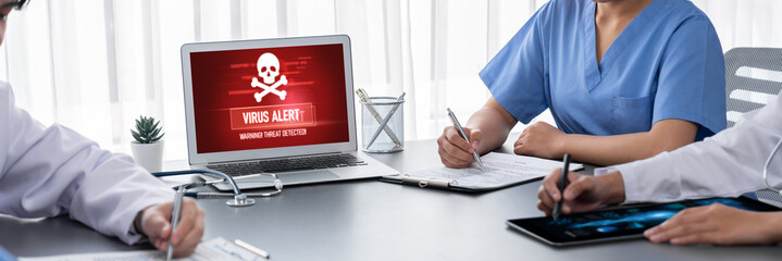 Virus warning alert on computer screen detected brisk cyber threat , hacker, computer virus and...