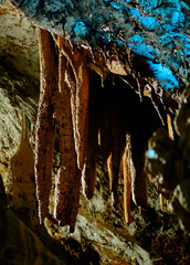 Illuminated Formations: Stalactites and Cave Textures in Oylat Cave