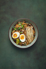 soba, buckwheat noodles, with enoki mushrooms, shimeji and boiled egg, top view, homemade, no people,