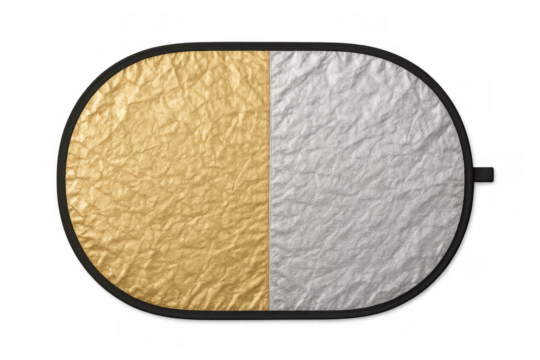 Gold and silver collapsible reflector on transparent background