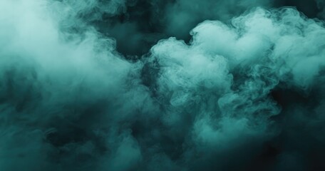 Teal smoke clouds against dark background
