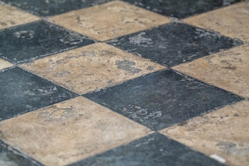 Black and white checkered tiles creating a classic geometric pattern