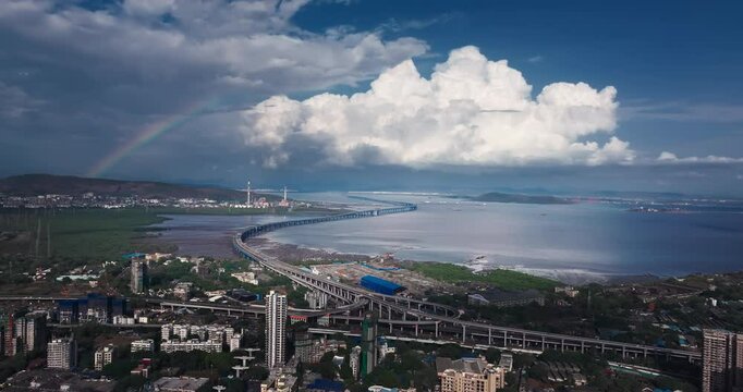 India's longest sea bridge is the Trans-Harbour Sea Link, located at the Atal Setu sea bridge in Mumbai, Maharashtra, India. During the monsoon, the weather is beautiful and cloudy.	

